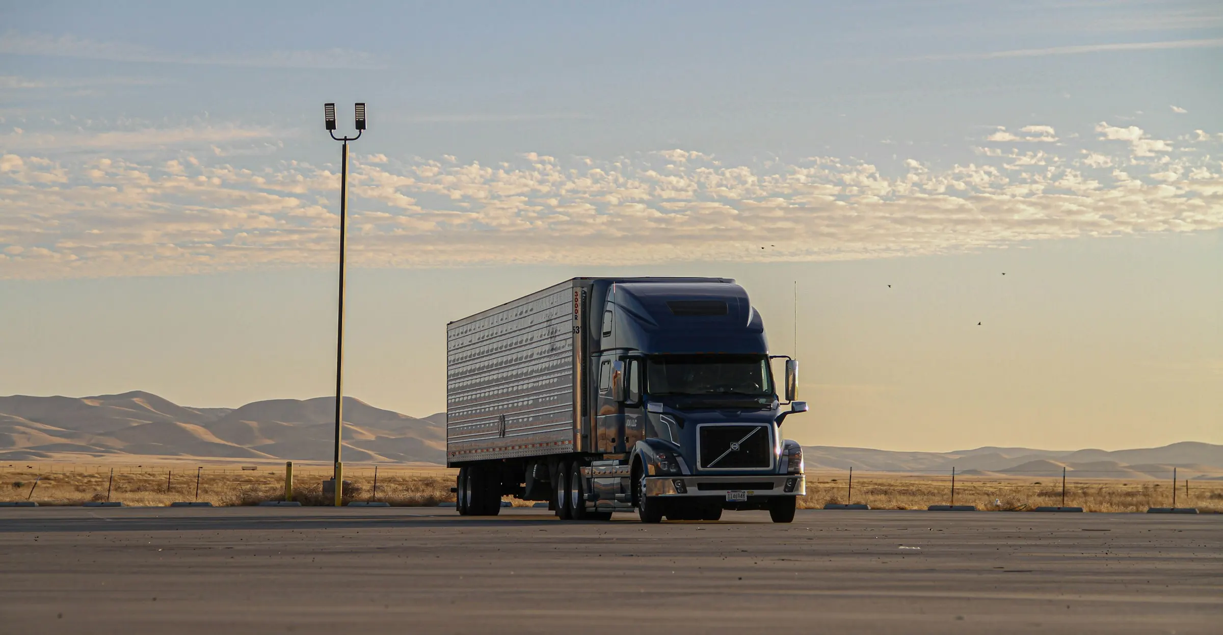 Heavy-duty commercial semi-truck receiving emergency mobile roadside repair on an Indianapolis highway